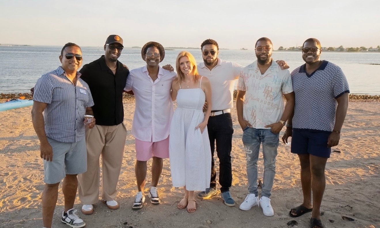 Group photo at beach sunset